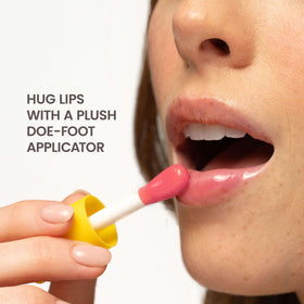 Burt's Bees ingredient display with jojoba almond meadowfoam, nourishing oils