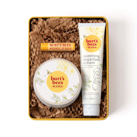 Burt's Bees gift tin front view showing three products and ready-to-gift benefit