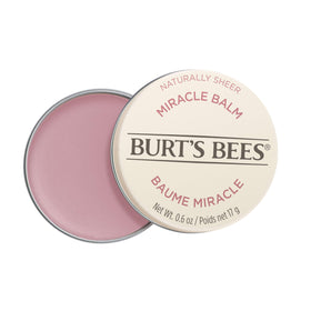 Burt's Bees tin front view showing compact travel-ready balm