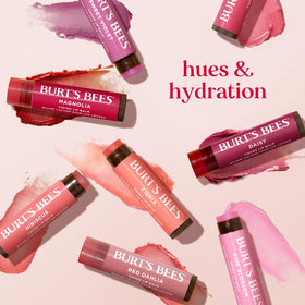 Burt's Bees Petal Rose balms in a purse demonstrating on-the-go use