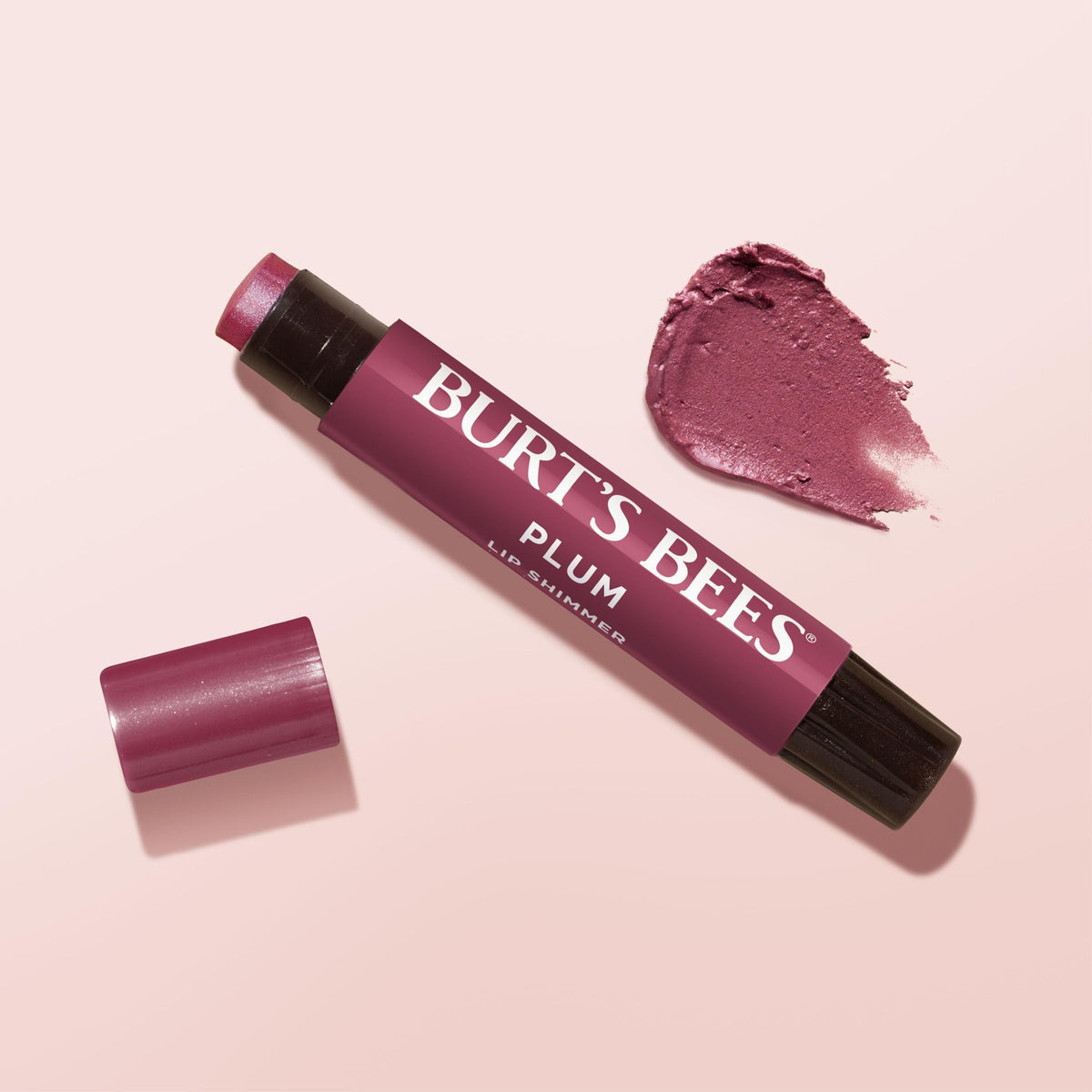 Burt's Bees in a handbag scene illustrating on-the-go touch-up convenience