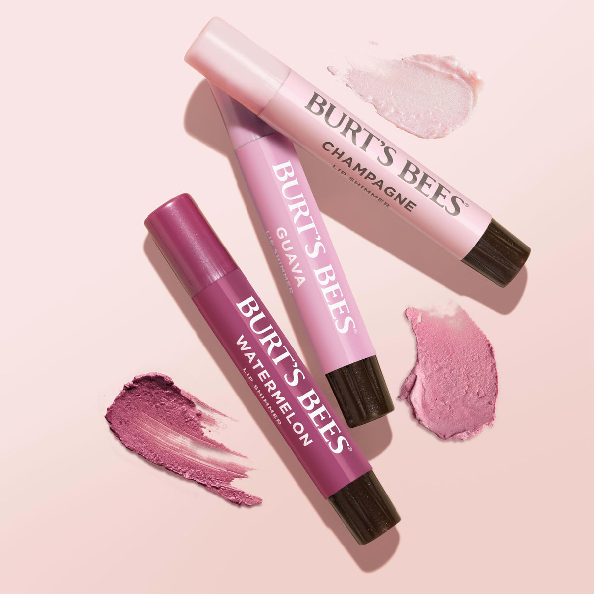 Burt's Bees tube beside coin showing travel-size volume and purse-friendly convenience