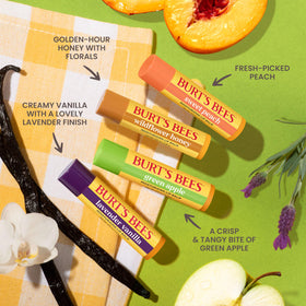 Burt's Bees tube in a purse demonstrating on-the-go convenience and compact size