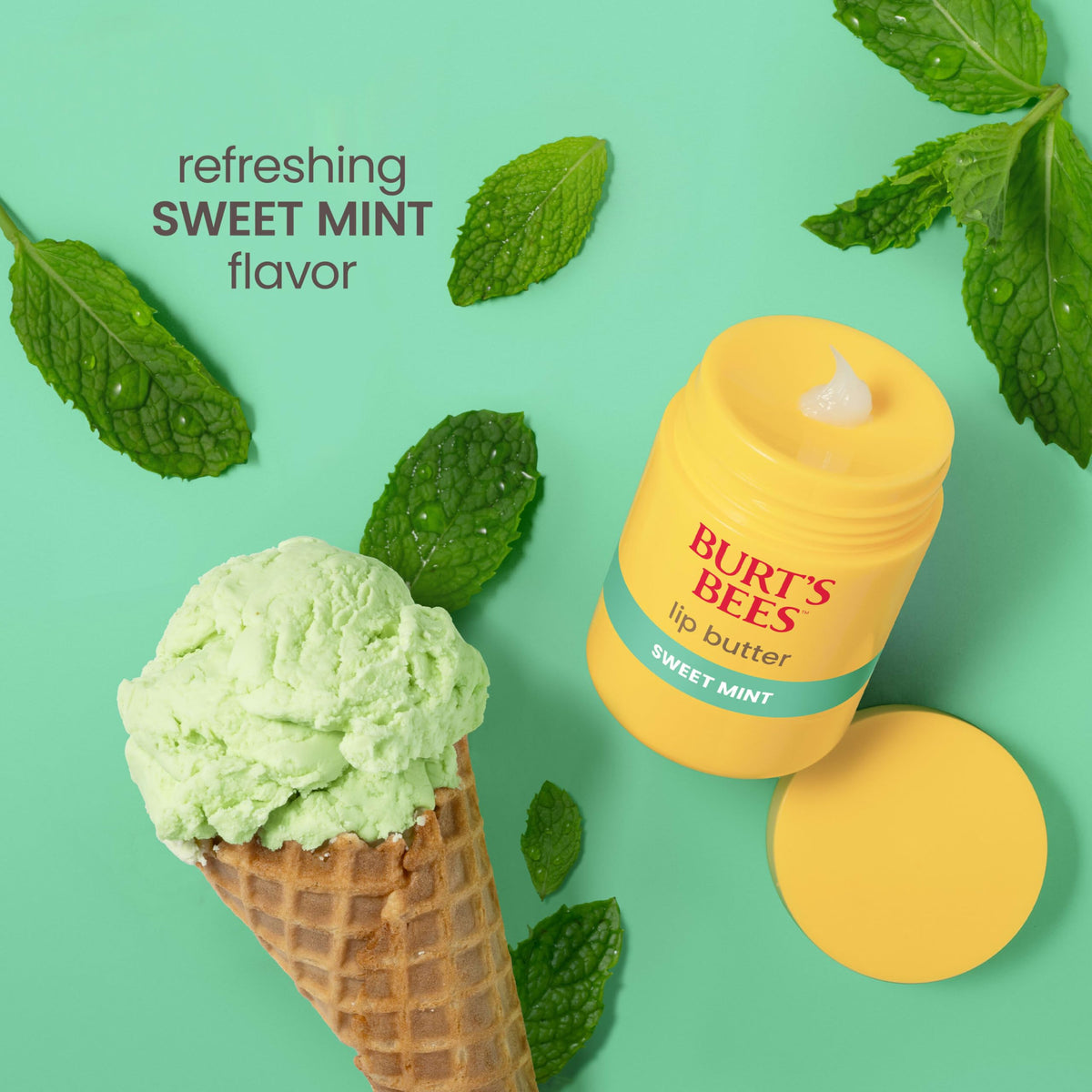 Burt's Bees 0.5 oz tube in hand to show compact travel-friendly size
