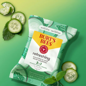 Burt's Bees wipe beside a credit card showing compact, travel-ready size