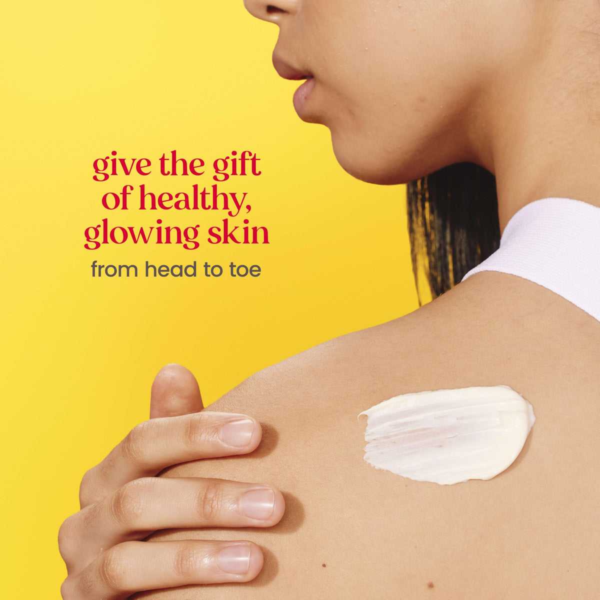 Burt's Bees kit next to credit card to show travel-friendly size