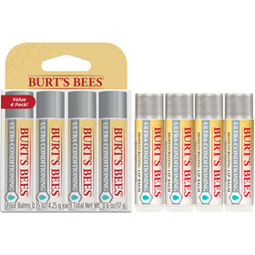Burt's Bees tube next to keys showing compact pocket-friendly size