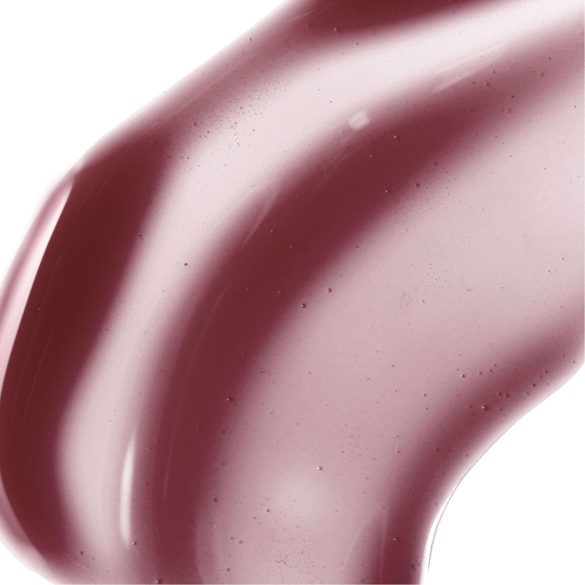 Burt's Bees swiped on lips showcasing sheer plum color and glossy shine