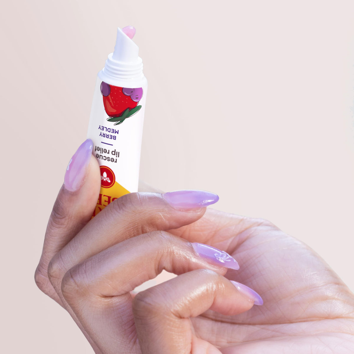 Burt's Bees balm texture swiped on hand demonstrating smooth, nonsticky finish
