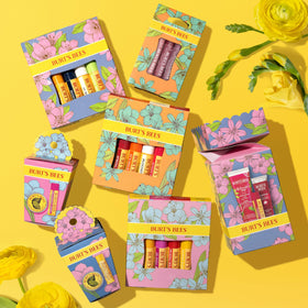 Burt's Bees Tropical Pineapple tube inside a tote bag — easy on-the-go lip care