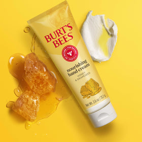 Burt's Bees tube in hand demonstrating easy application and portability