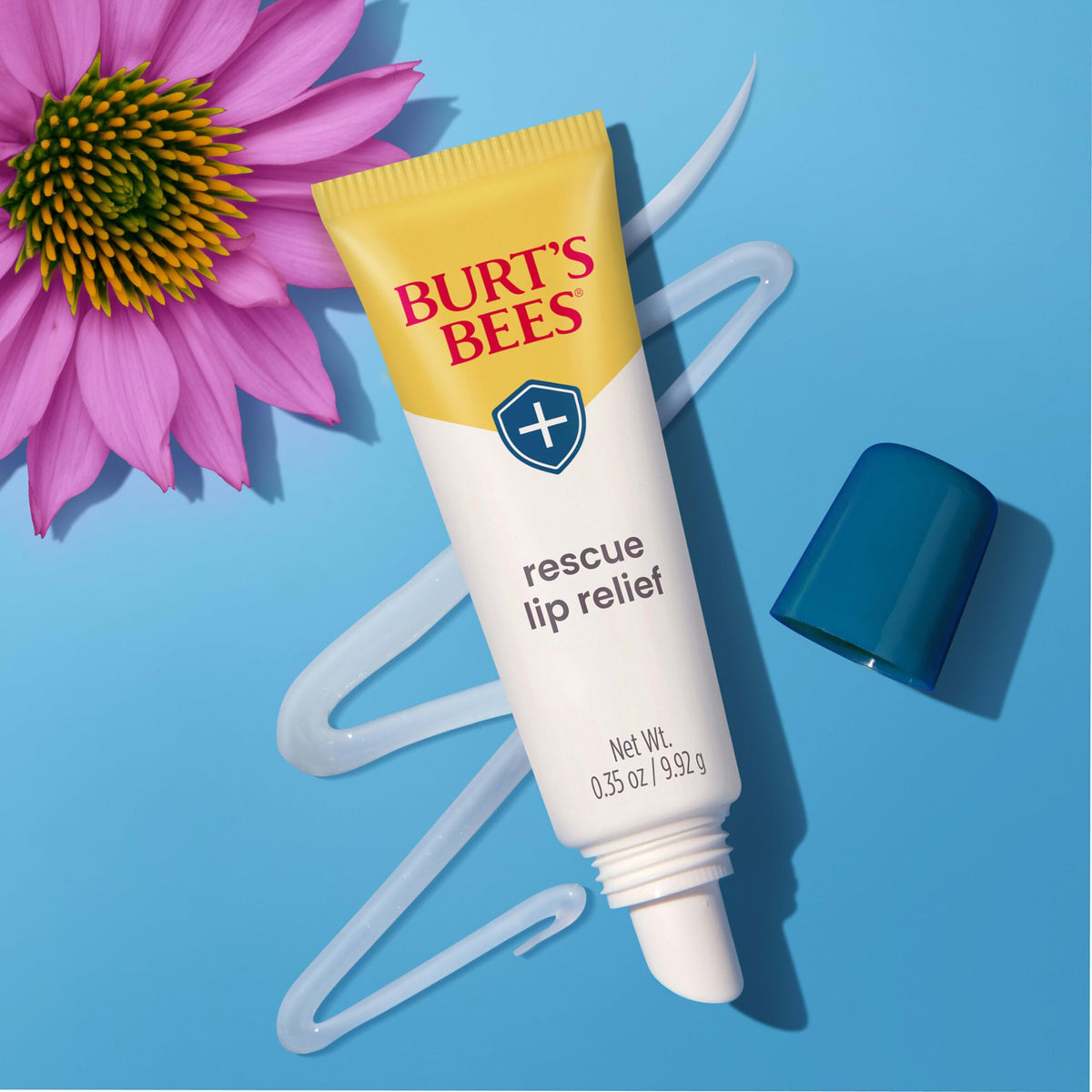 Burt's Bees tube tucked in a purse pocket portraying on-hand convenience benefit
