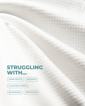buttah towel held in hand showing large size and coverage benefit