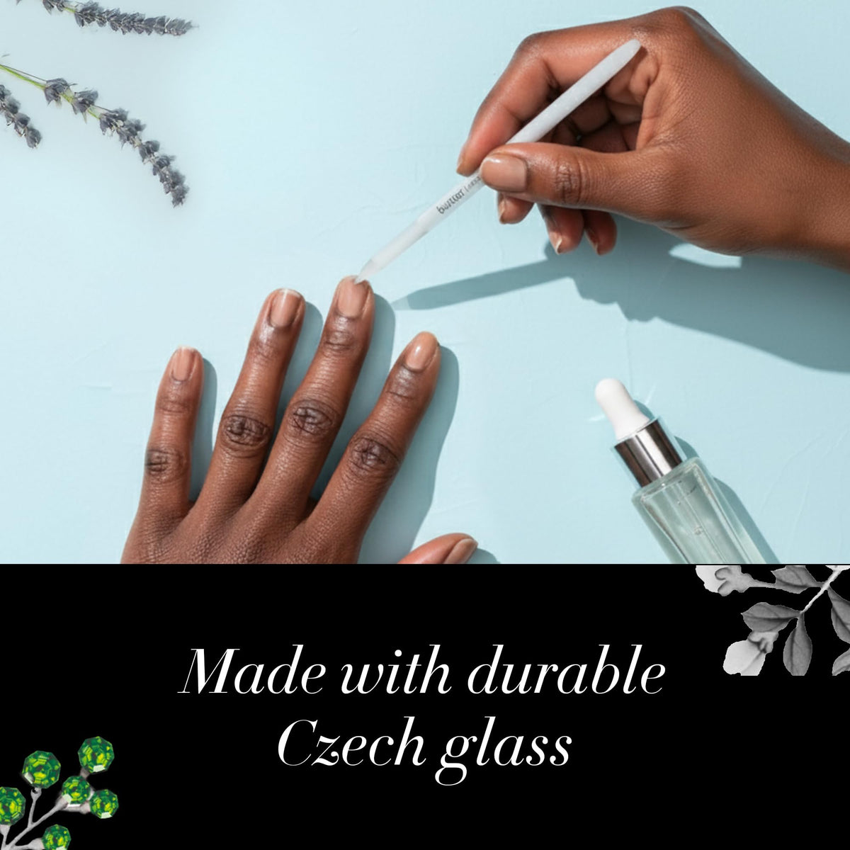 butter LONDON tool in use pushing back cuticles for neat salon-quality manicure