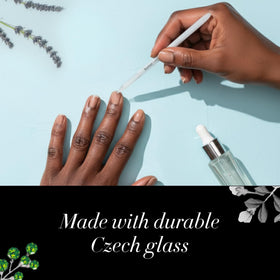 butter LONDON tool in use pushing back cuticles for neat salon-quality manicure