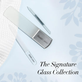 butter LONDON cuticle pusher beside ruler showing travel-friendly compact size