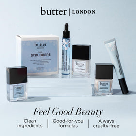 butter LONDON styled hands holding clutch showing moisturized cuticles benefit