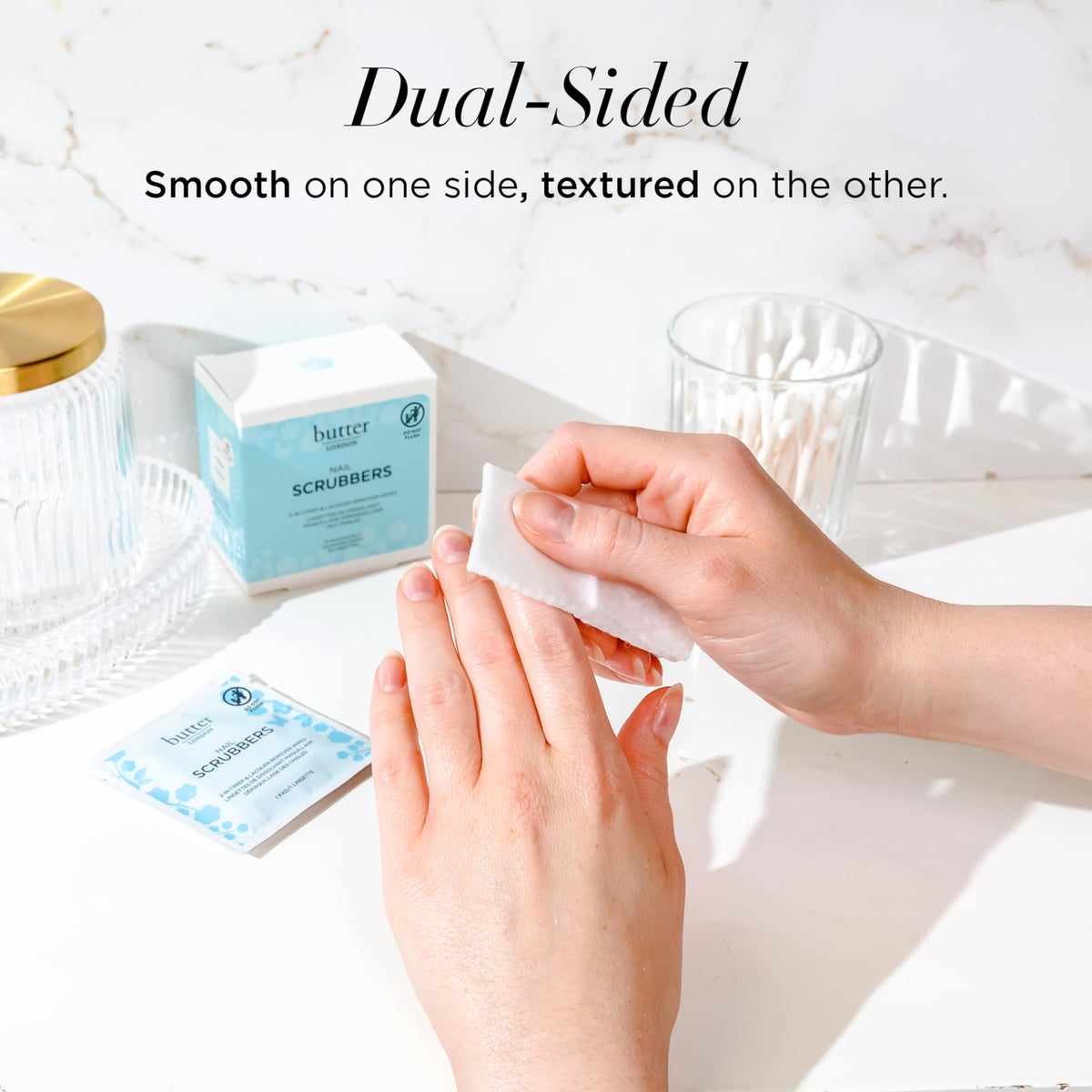 butter LONDON saturated pad showing conditioning solution to hydrate cuticles