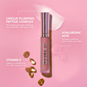 Buxom lifestyle model applying gloss for instant shine and plumping effect