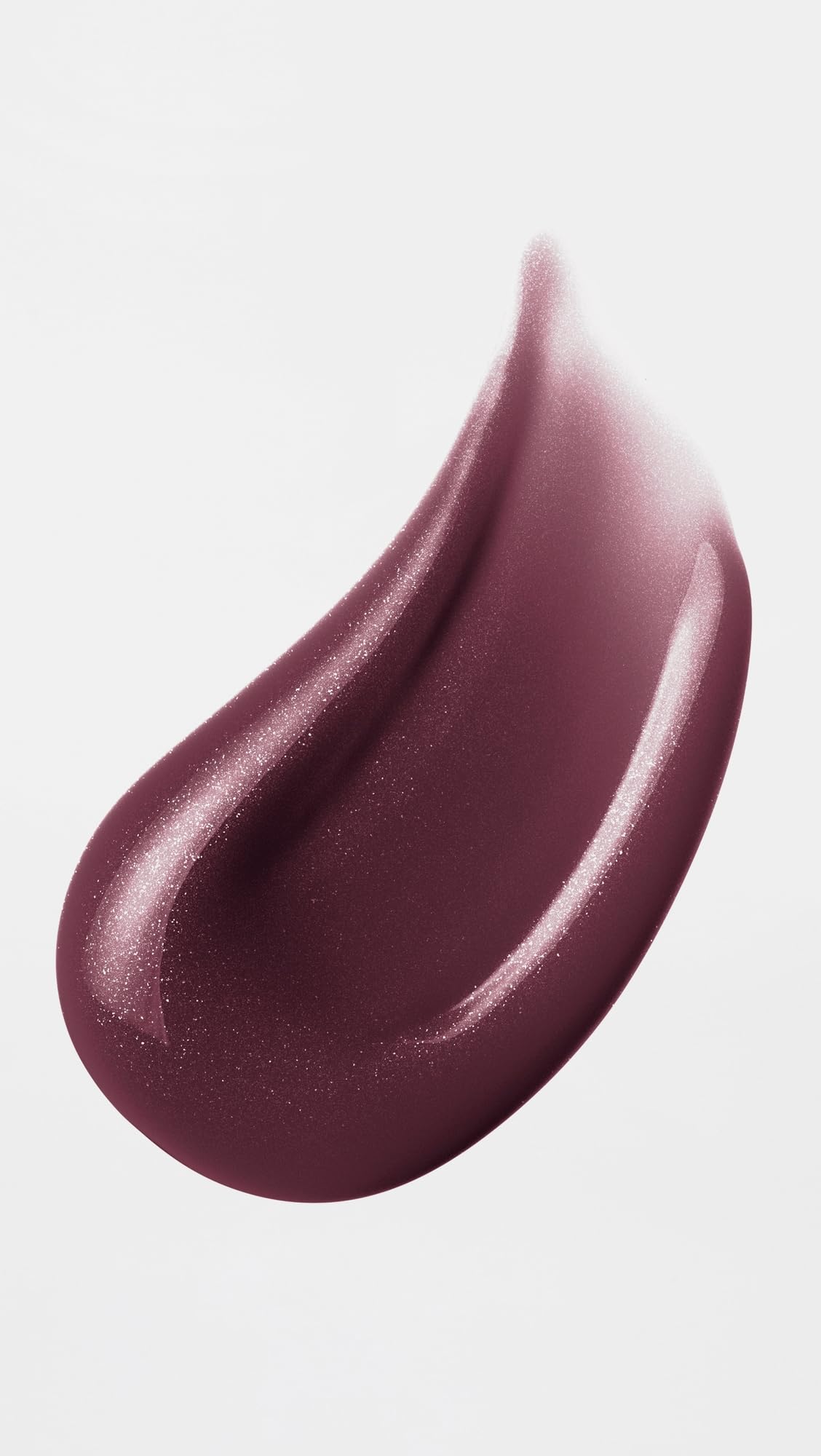 Buxom swatch on hand reveals brown-mauve shimmer and buildable color