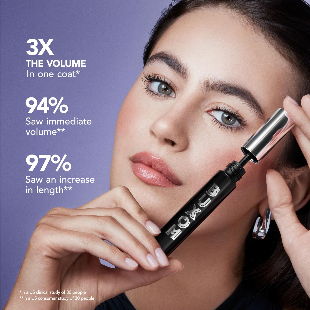 Buxom texture swipe showing glossy black formula and patent-leather pigment finish