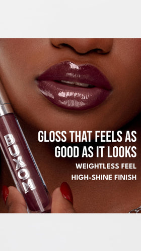 Buxom size and scale next to lipstick showing convenient tube dimensions