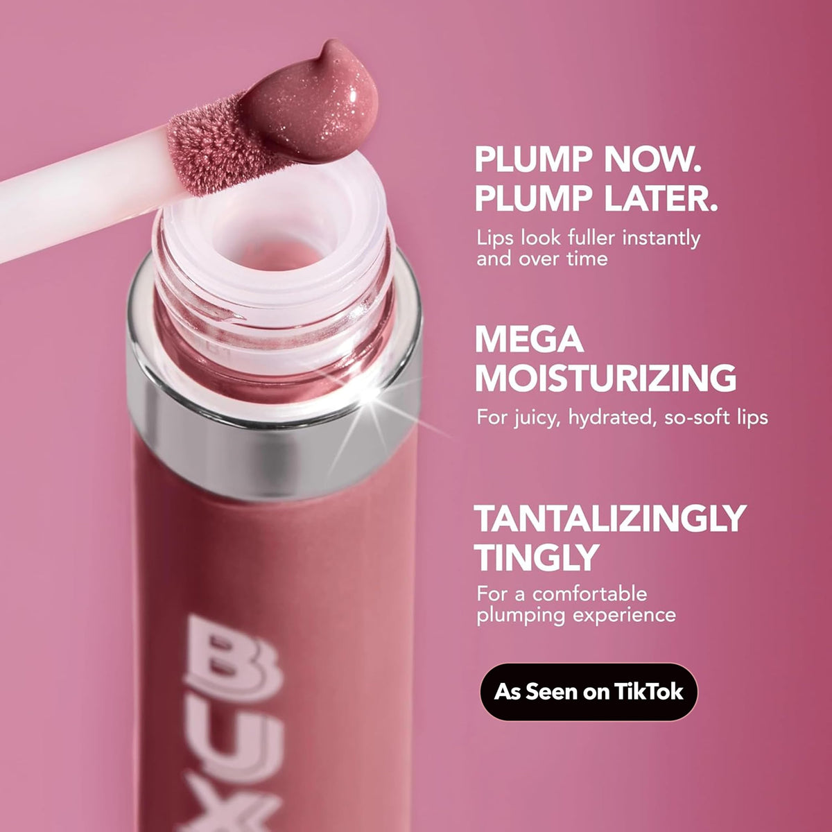 Buxom tube in hand showing compact size and travel-friendly convenience