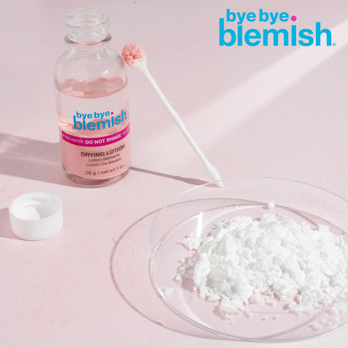 Bye Bye Blemish bottle on nightstand beside skincare items showing bedtime routine benefit overnight action