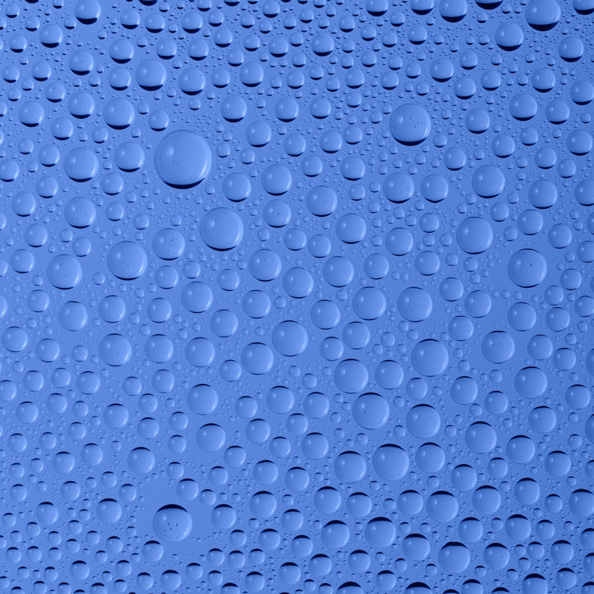 BYOMA close-up of mist droplets on skin showing hydrating texture
