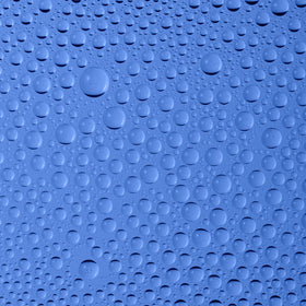 BYOMA close-up of mist droplets on skin showing hydrating texture