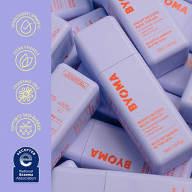 BYOMA cream beside a hand for scale to show compact 1.69 fl.oz size and travel convenience