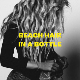 BYRD bottle in hand for scale showing travel-friendly 8 fl oz benefit