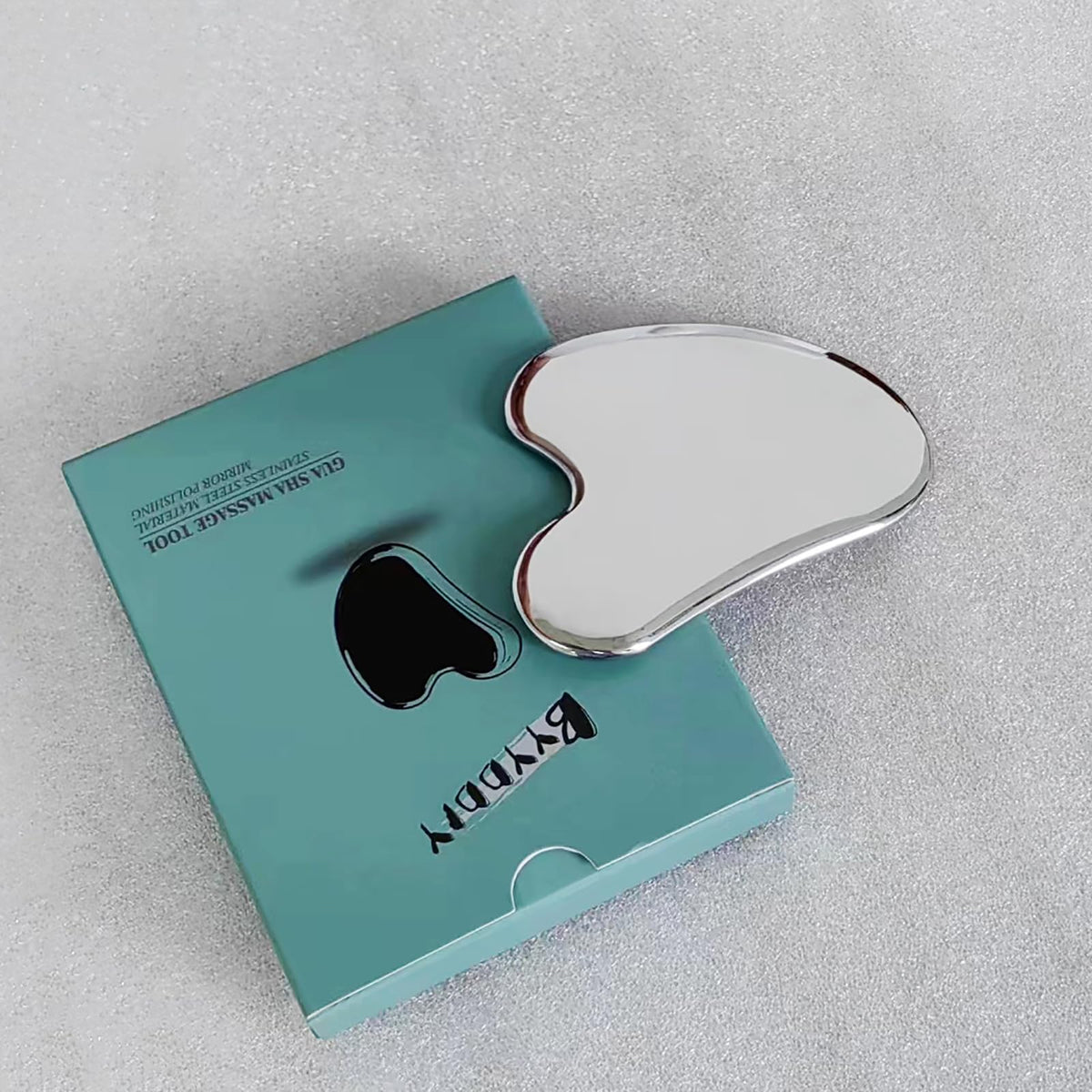 BYYDDIY tool in use on cheek demonstrating sculpting massage benefit