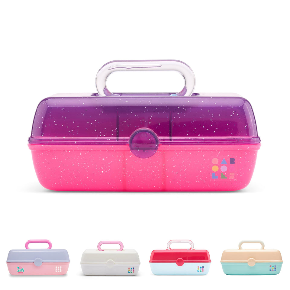 Caboodles front view showing two-tone purple and pink sparkle finish and handle for stylish portability