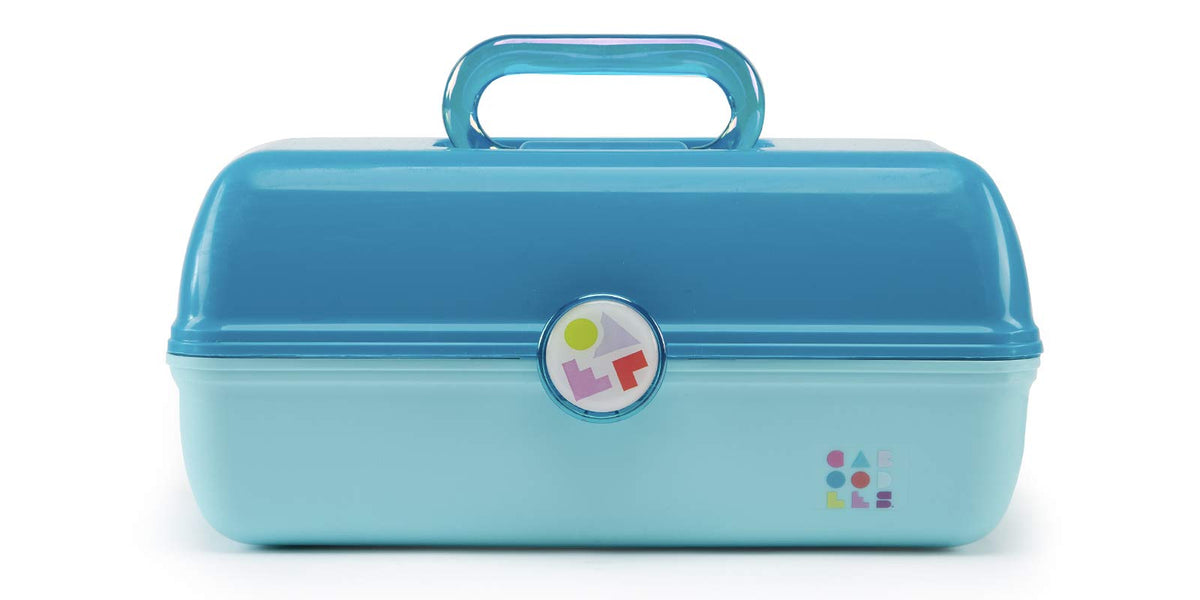Caboodles turquoise exterior front view showing secure latch and compact portability