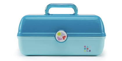 Caboodles turquoise exterior front view showing secure latch and compact portability