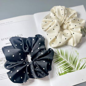 CAFUDEYE scrunchie in hand for scale, large size fit benefit