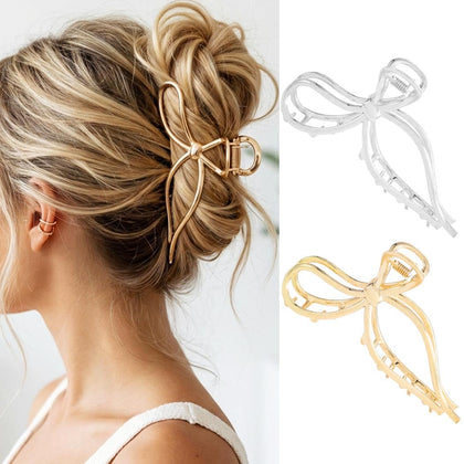 CAKURE gold bow clip front view showing polished finish and decorative bow
