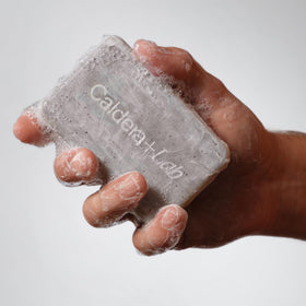Caldera + Lab lather in hand demonstrating rich foam for full-body cleansing