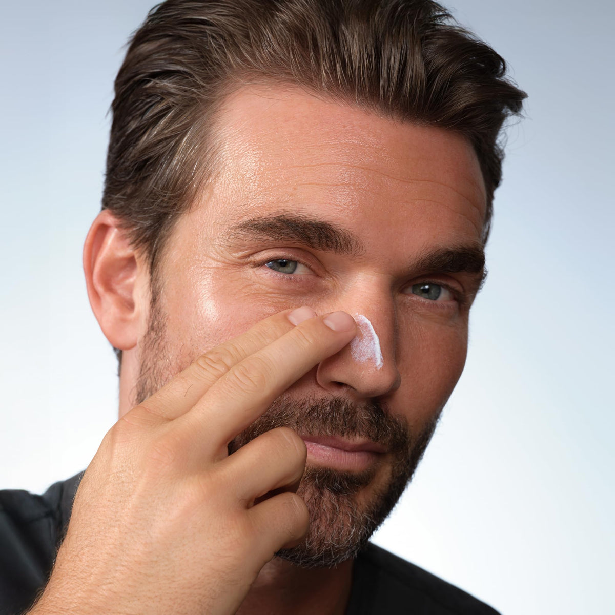 Caldera + Lab sunscreen spread on hand demonstrating quick blend-in benefit