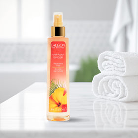 Calgon bottle beside matching body cream suggesting layering for longer-lasting scent