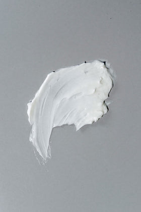 California Born styling cream being applied to wet hair for easy distribution