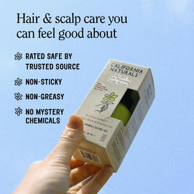 California Naturals applying serum to scalp demonstrating simple massage, targeted delivery benefit