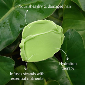 California Naturals pouring creamy conditioner texture for deep hydration