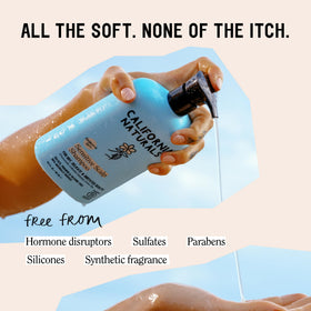 California Naturals shampoo texture on palm showing gentle creamy lather