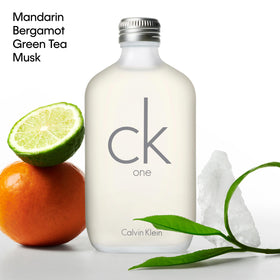 Calvin Klein CK One being sprayed to show application and instant freshness