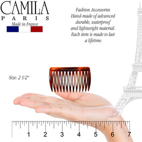 Camila Paris combs held in hand to show compact size and lightweight feel