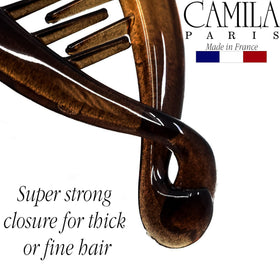 Camila Paris CP2 securing a thick ponytail demonstrating strong all-day hold without creases