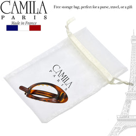 Camila Paris barrette in hand showing 3.5-inch scale for styling decisions benefit