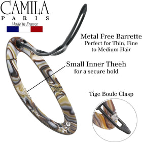 Camila Paris barrette holding a bun firmly without tugging or hair damage